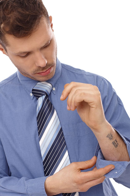 Male employee with tattoo
